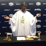 Fr. Frank Permuy celebrates Mass for the Miami Marlins and Tampa Bay Rays on April 11, 2014